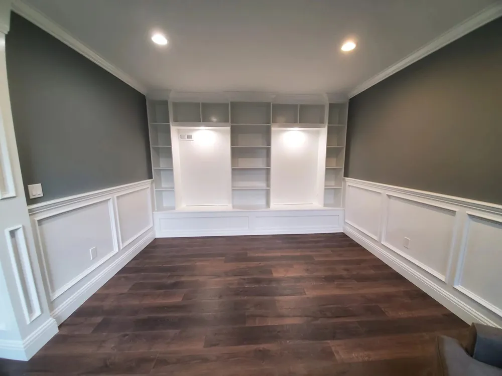 Built-in library wall with a bench and wainscoting, a CoreBuild project